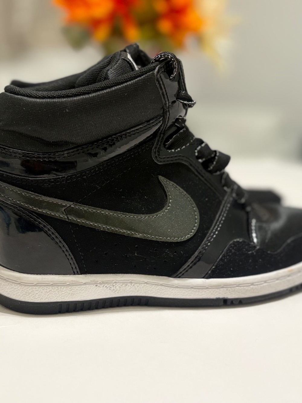 Nike Force Sky HighWomen's Hidden Wedge Sneakers in black.